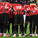 I giocatori del Milan in cerchio